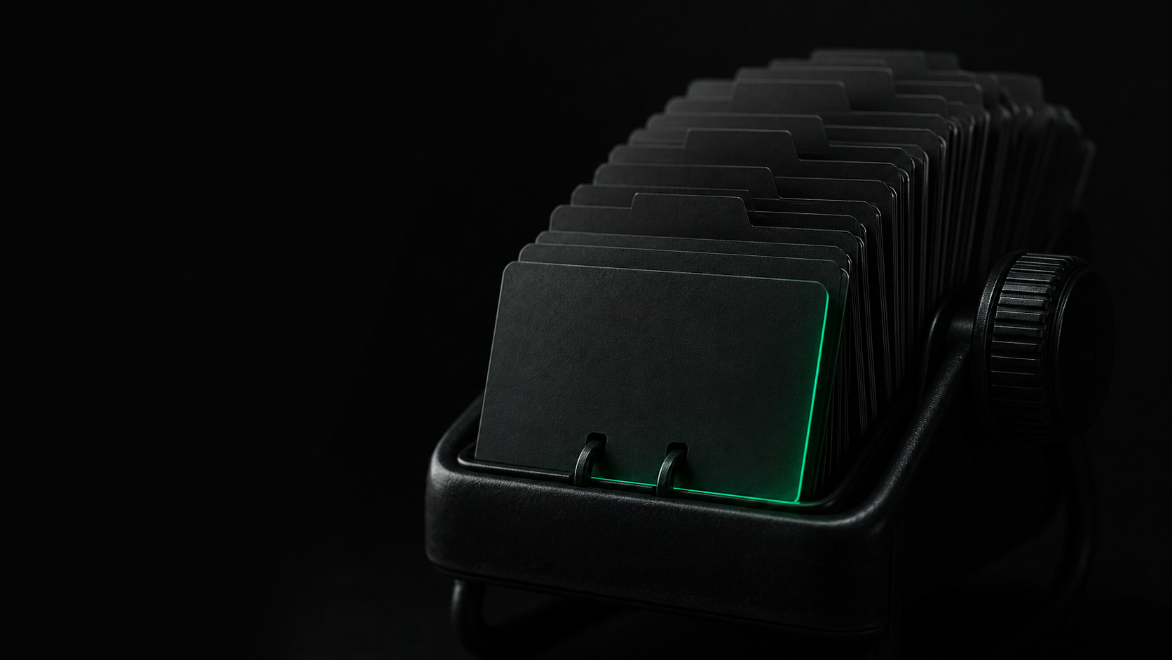 A dark rolodex of contact cards fading to black one by one, the last card's teal glow slowly dimming out like a dying ember